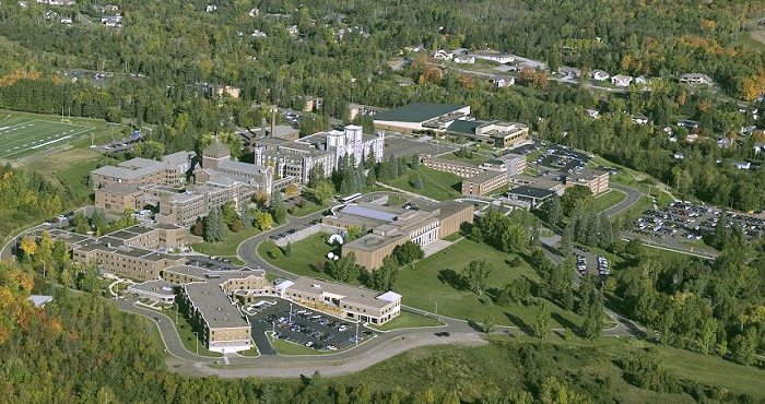 St. Scholastica campus with the Benedictine Living Community of Duluth to the left of the Monastery and with The College of St. Scholastica to the north and in front of the Monastery.