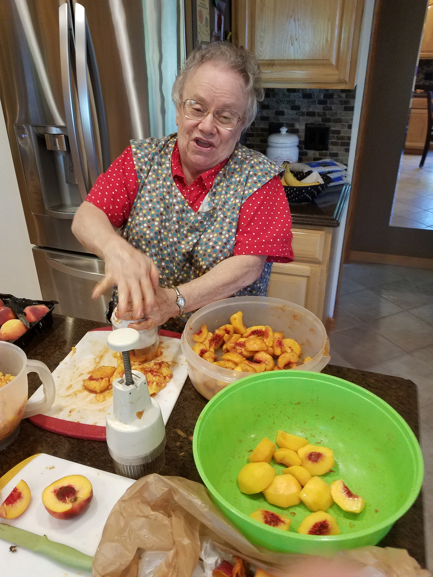 Sister Pauline makes peach jam for the Christmas Bazaar
