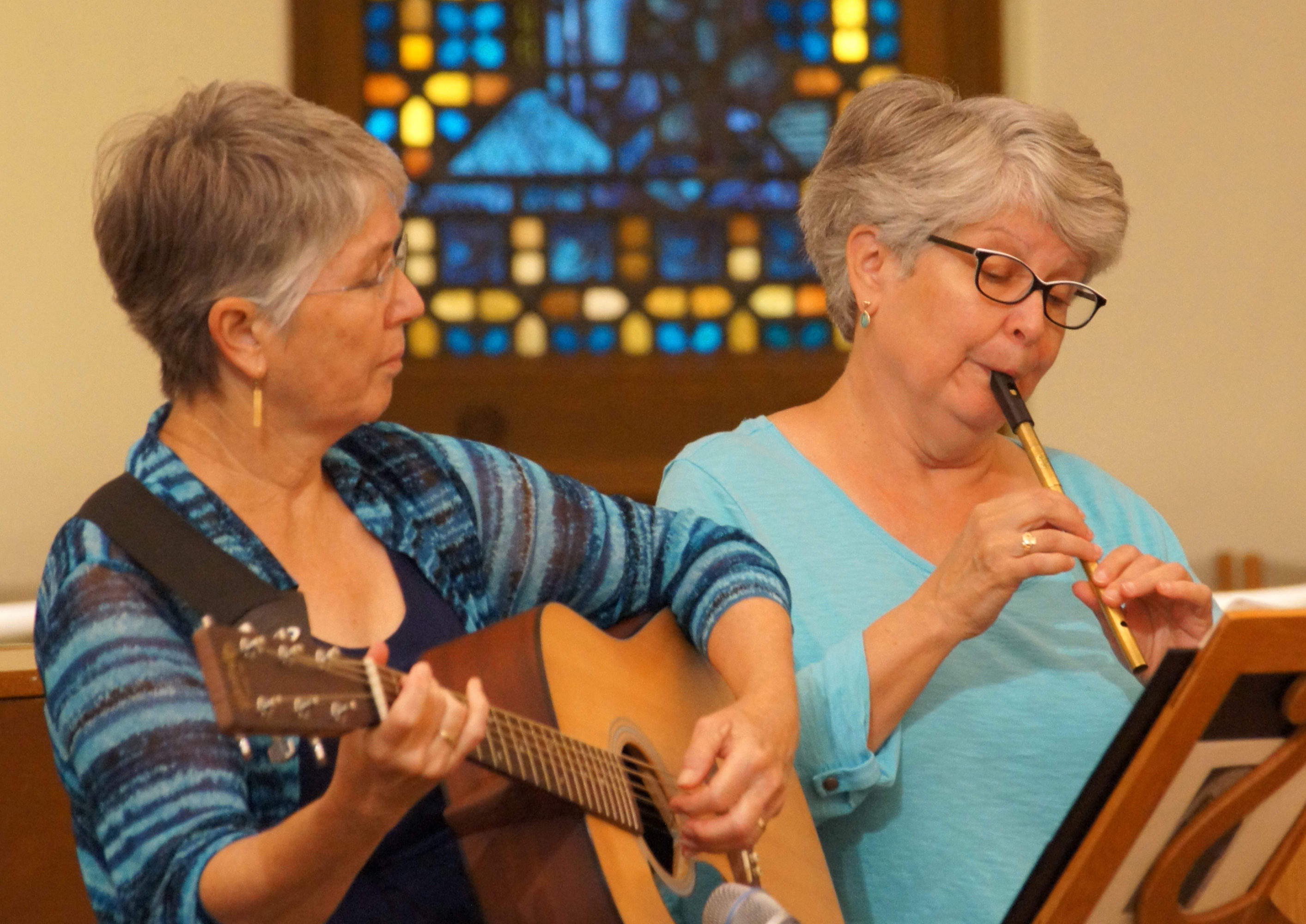 Mary Bridget Lawson and Marianne Connelly play at a Sister's Perpetual Monastic Profession