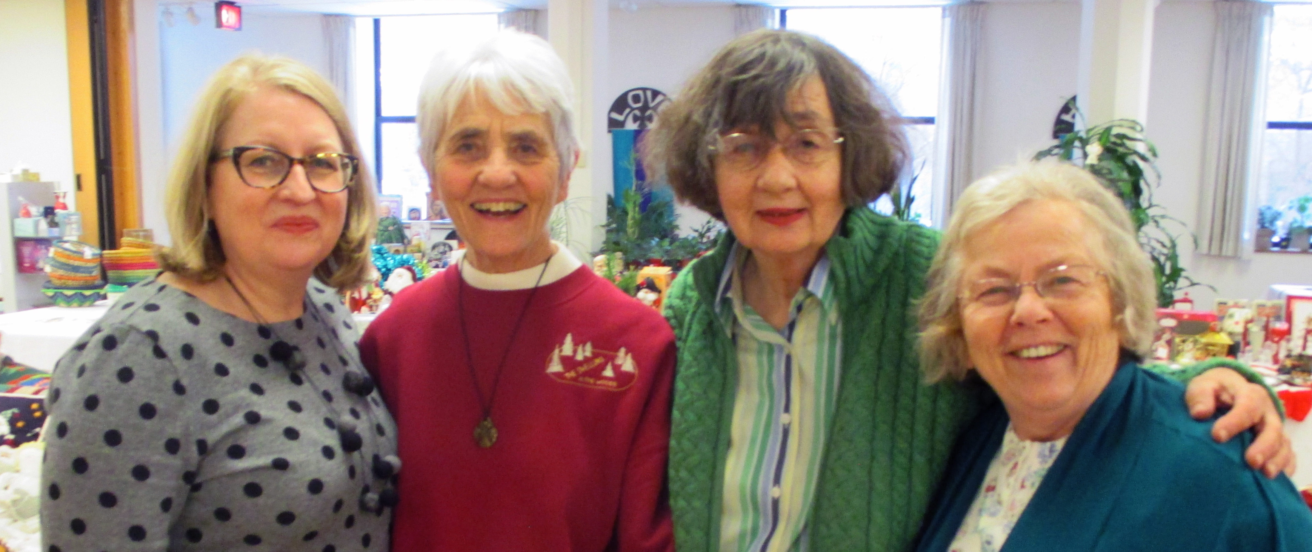 Lisa Roseth, Sister Theresa Spinler, Kathy Noble, and Mary Tanner plan the Monastery Christmas Bazaar.