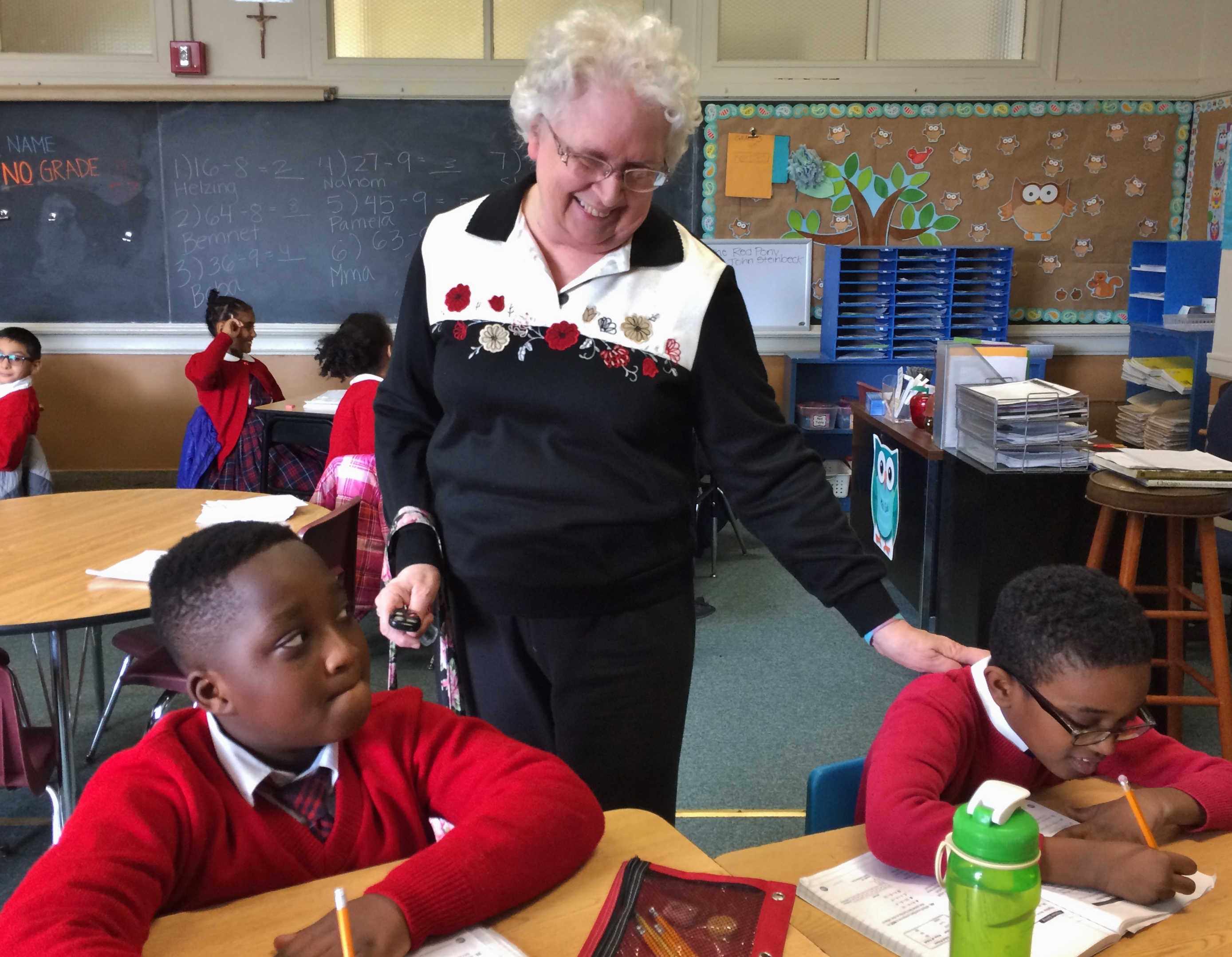 Sister Lois Ann Glaudel with some of her younger students in Chicago