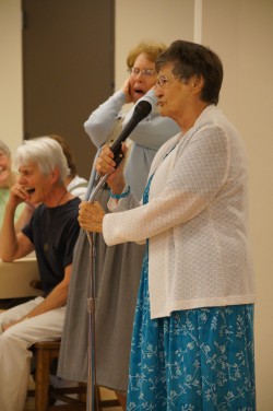 Sr. Theresa Spinler laughs as Sr. Jeanne Ann Weber and Sr. Barbara Higgins entertain the Community