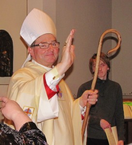 Newly Installed Bishop Powers blesses the people