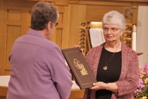 Sister Beverly Raway receives the Rule of St. Benedict