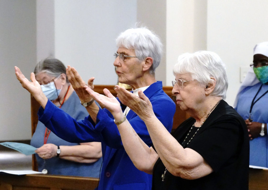 SisterTheresa Spinler and Sister Claudia Cherro sing the Suscipe at their 60th jubilee.