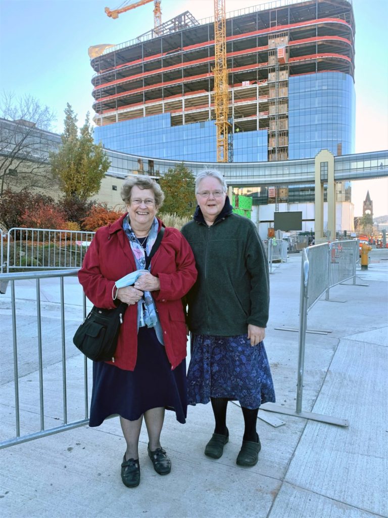 Srs Danile Lynch and Therese Carson in front of new SMMC under construction