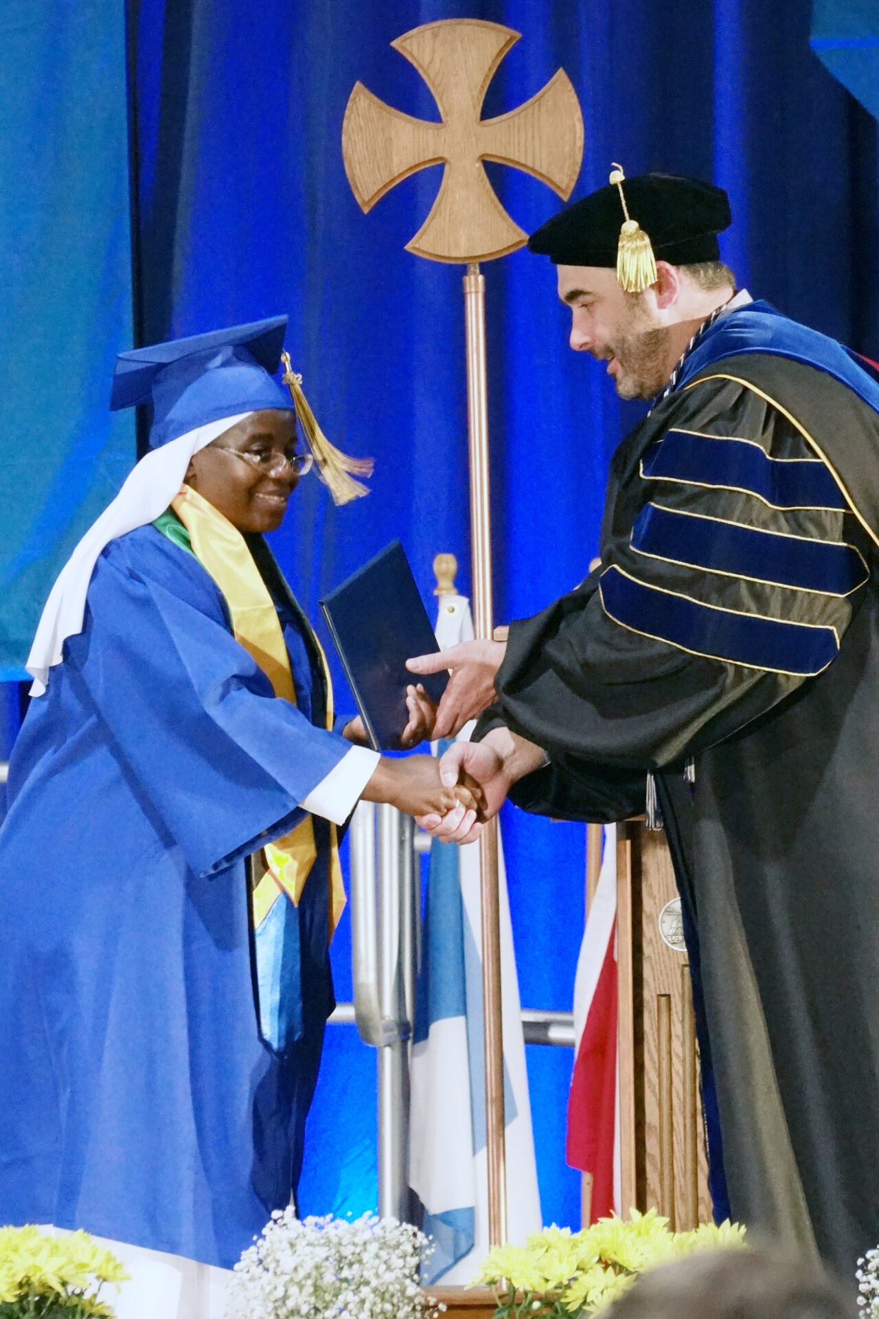 Sr Charity Nkwera receives her diploma for Bachelor's in Psychology