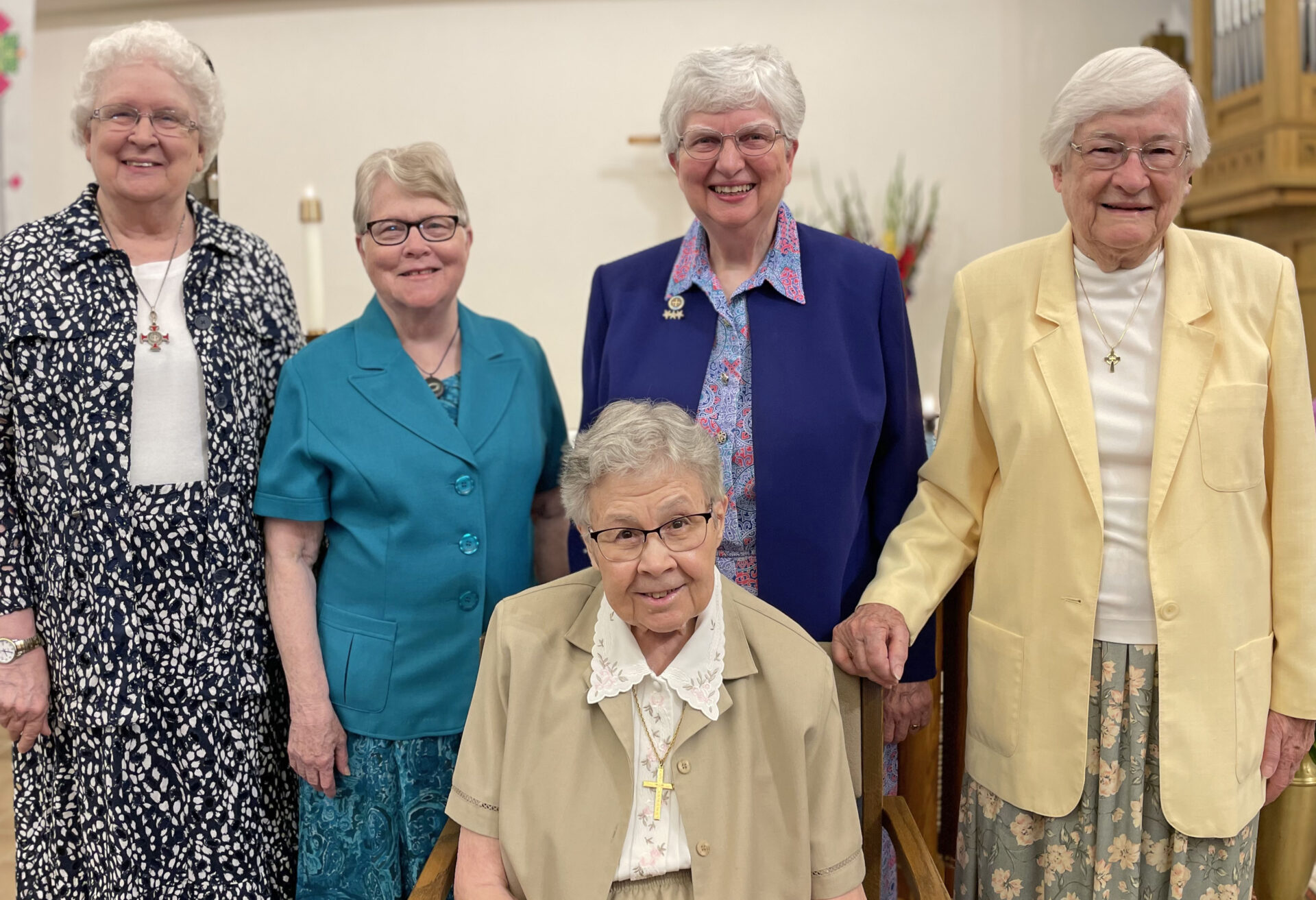 Our 2024 Jubilarians: Sisters Lois Ann Glaudel, Mary Susan Dewitt, Annella Wagner and Kathleen Hofer, woth Sister Beverly Raway (in dark blue)