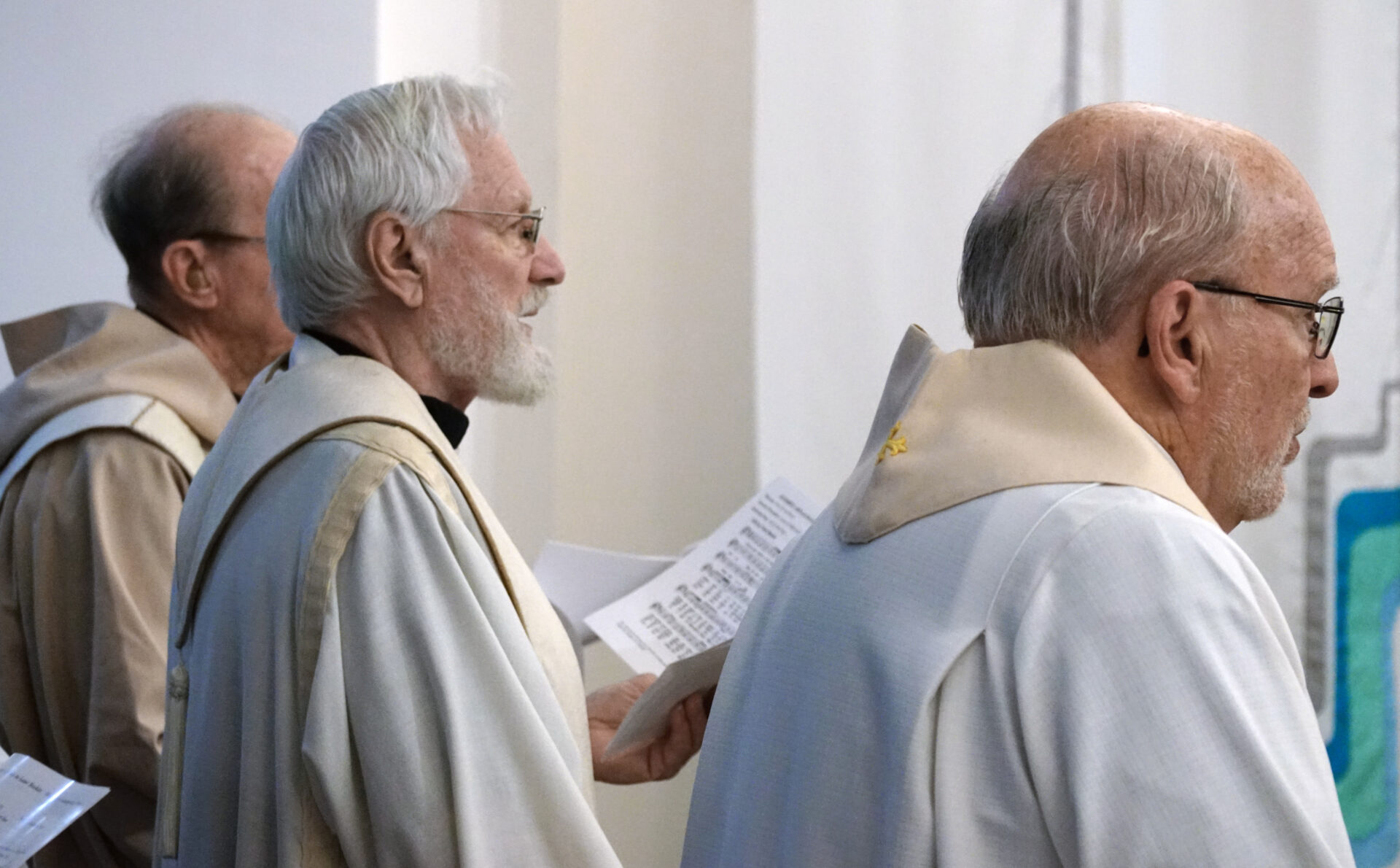 Rev. William Fider, Dennis Hoffman, and Corbin Eddy concelebrated Mass.